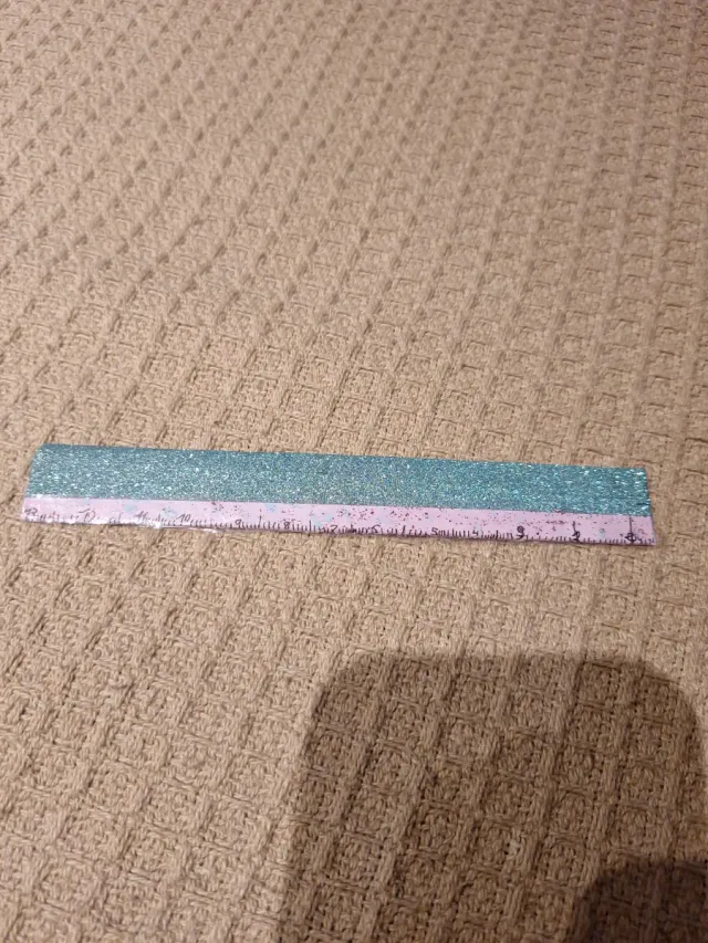 Regla decorada con purpurina