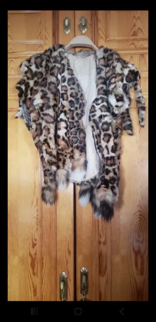 Chaleco de piel de conejo animal print talla L-XL.