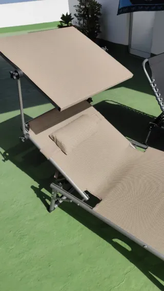 Tumbona plegable con parasol
