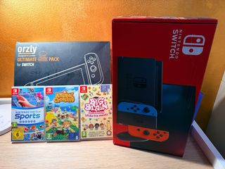 Nintendo Switch + 3 giochi + scatola accessori