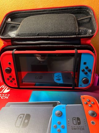 Nintendo Switch + 3 giochi + scatola accessori