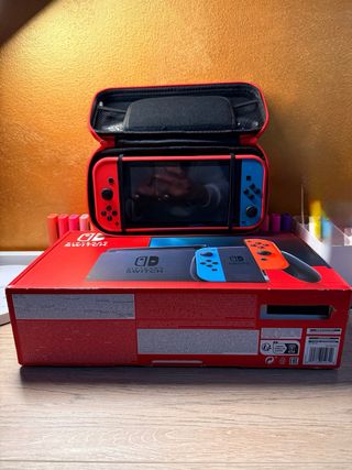 Nintendo Switch + 3 giochi + scatola accessori