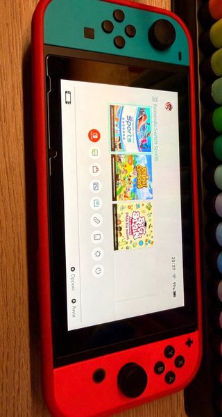 Nintendo Switch + 3 giochi + scatola accessori