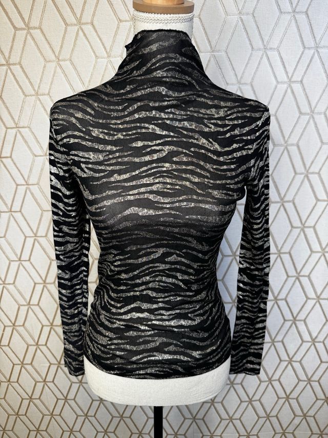 Camiseta animal print brillos semitransparente