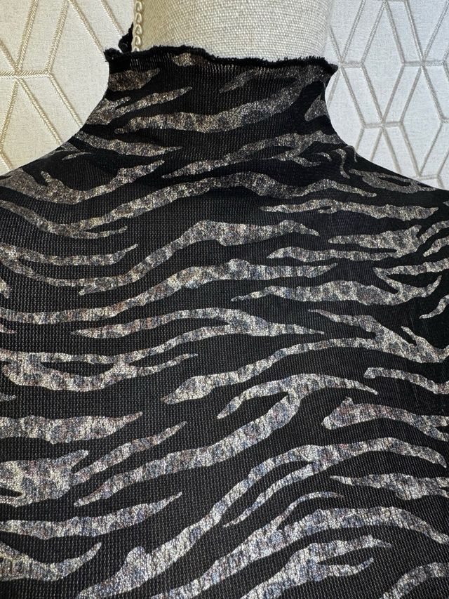 Camiseta animal print brillos semitransparente