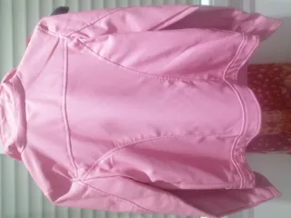 Cazadora niña rosa chicle. Regalo calentadores.