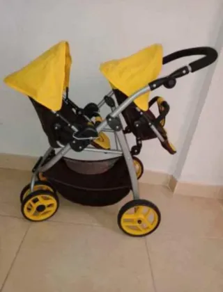 Carrito de muñecas doble amarillo