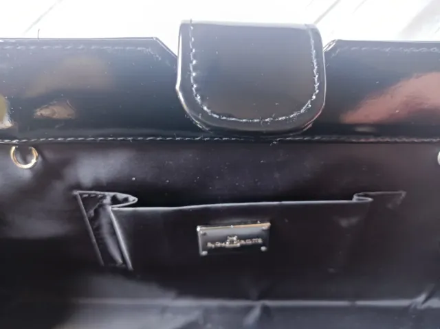 Cartera de mano fiesta negra.