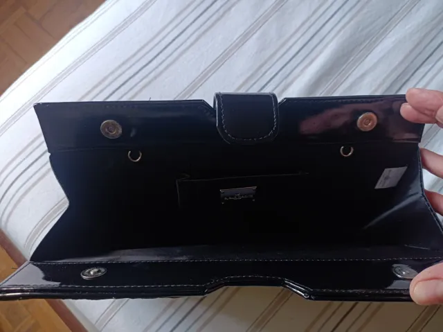 Cartera de mano fiesta negra.