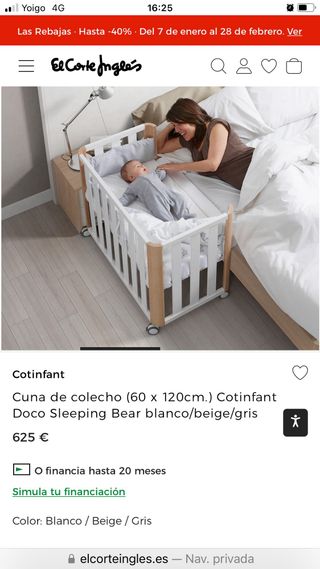 Cuna de madera blanca y detalles en madera