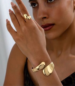 Conjunto Pulsera y Anillo Dorado