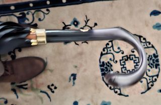 Ombrello Dior con puntale da riparare