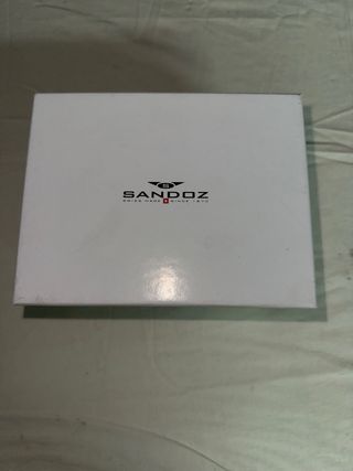 Caja Sandoz