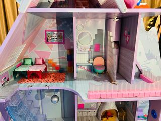 Casa de muñecas LOL.