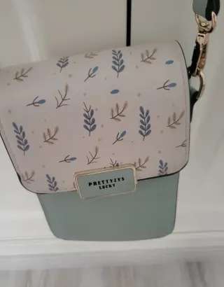 Bolso bandolera verde agua con estampado