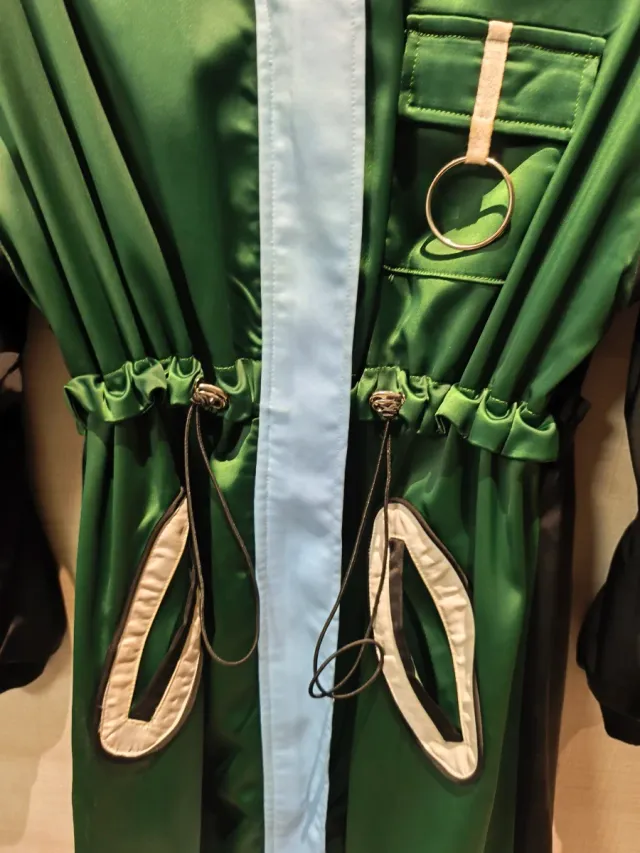 Parka combinada verde y azul