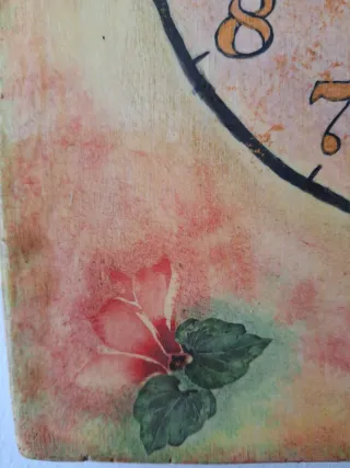 Orologio da parete decorato con ciclamini