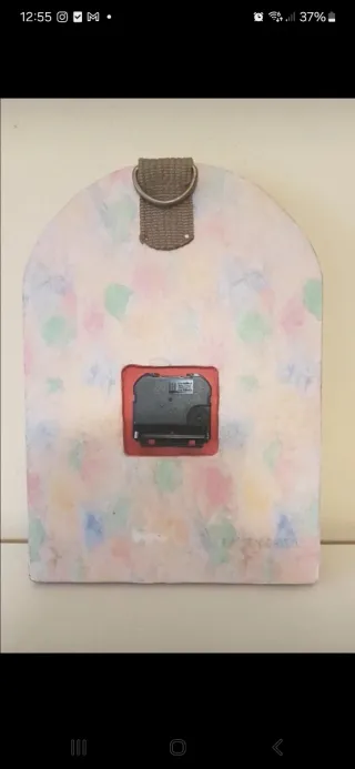 Orologio da parete decorato con ciclamini