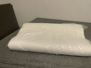 Cuscino bianco in tessuto