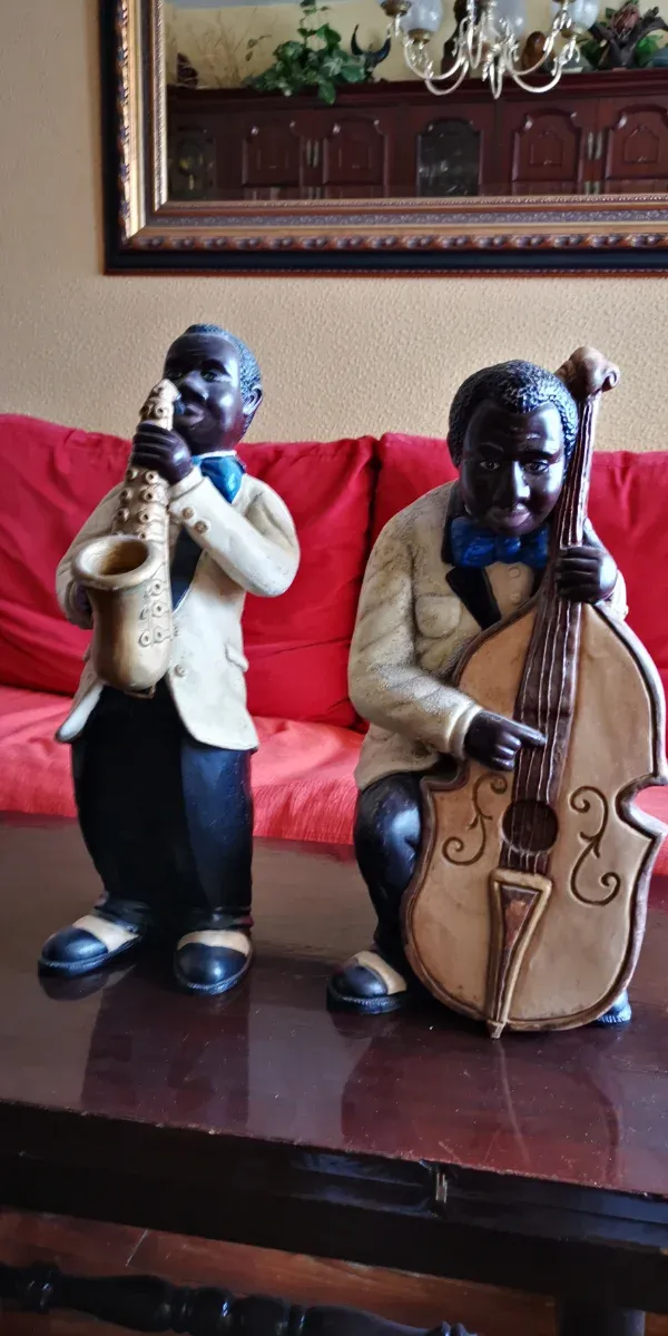 Pareja músicos escayola negros
