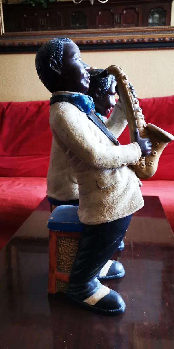 Pareja músicos escayola negros