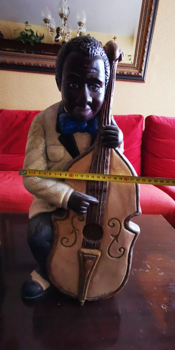 Pareja músicos escayola negros