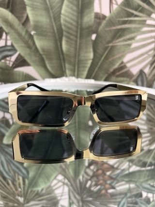 Occhiali da sole oro e neri