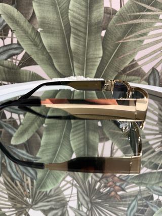 Occhiali da sole oro e neri