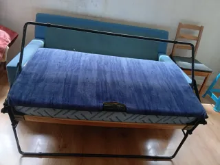 Divano letto in tessuto e metallo