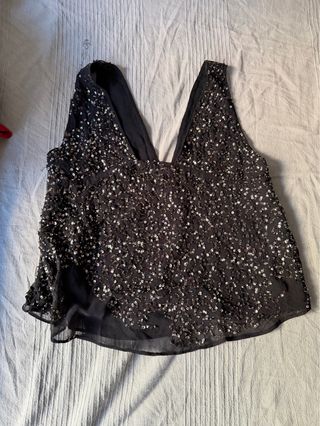 Blusa fiesta lentejuelas negra y plata