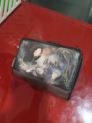 Monedero Anekke beige y marrón cierre roto