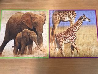 Lote 2 Puzzles WWF 100 Piezas Elefantes y Jirafas