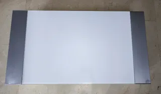 Tavolo rialzabile in vetro e acciaio