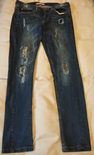 Pantalones vaqueros desgastados azules