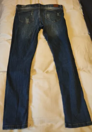 Pantalones vaqueros desgastados azules