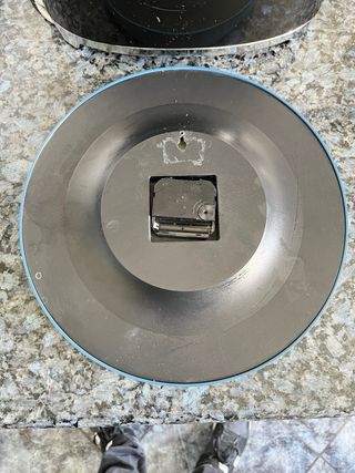 Reloj de pared azul verdoso