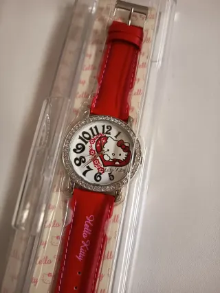 Reloj Hello Kitty Correa Roja y Bisel Plateado