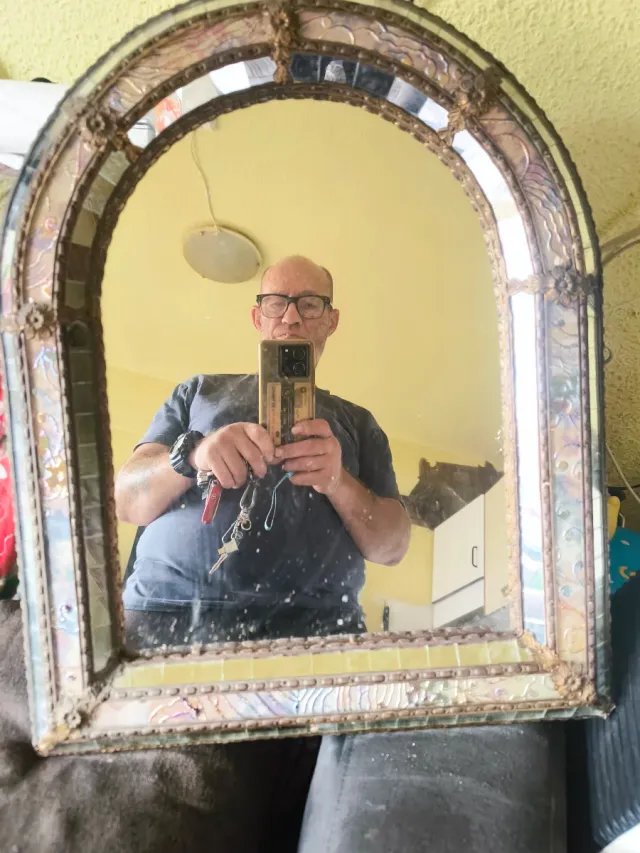 Espejo veneciano con un arco