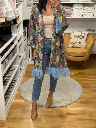 Poncho Uterqüe S. lentejuelas plumas