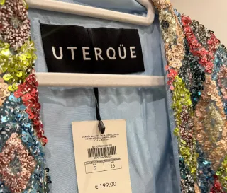 Poncho Uterqüe S. lentejuelas plumas