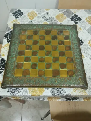 ajedrez de bronce