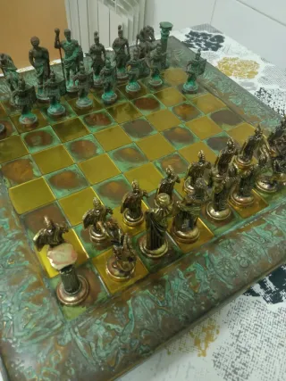ajedrez de bronce