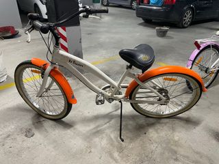 Bicicleta Btwin Naranja y Blanca