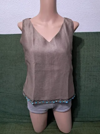 Blusa sin mangas con detalle turquesa Ideal coctel