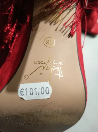 Stivaletti rossi con frange