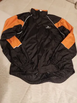 Chubasquero cortavientos Boomerang negro/naranja