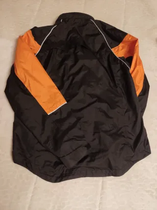 Chubasquero cortavientos Boomerang negro/naranja