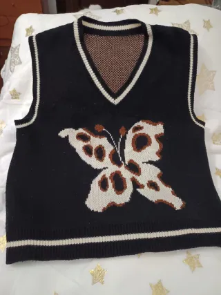 Chaleco de punto con mariposa