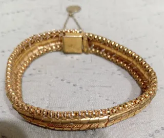 Pulsera vintage ancha bañada en oro con medallita
