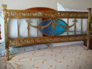 Cabecero vintage metal dorado con cristal azul